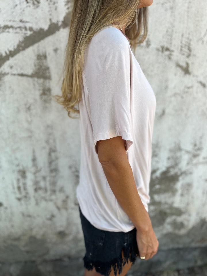 Blusa femenina casual con torsión frontal y color sólido