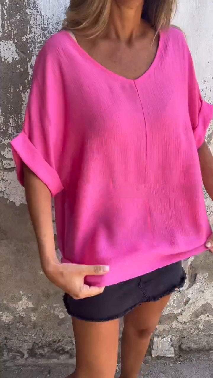 Top casual con mangas medias y escote en V