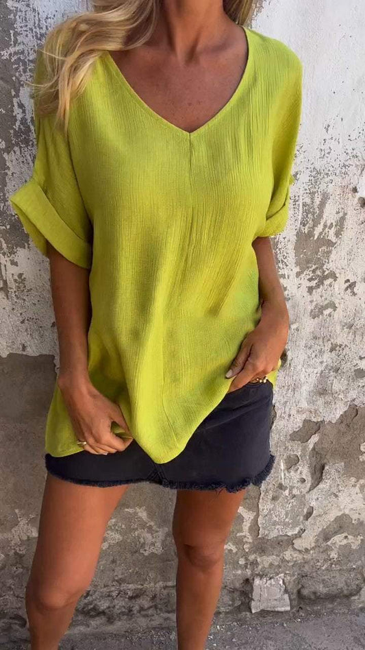 Top casual con mangas medias y escote en V